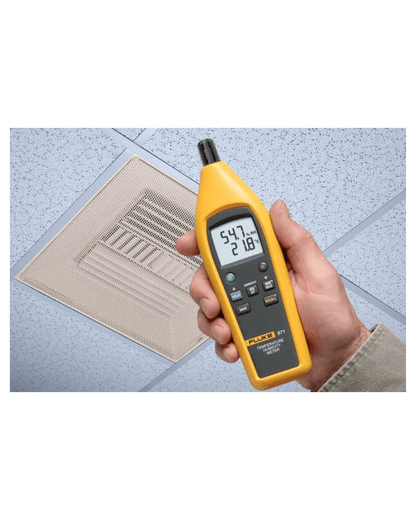FLUKE 971 temperature and humidity meter in hand